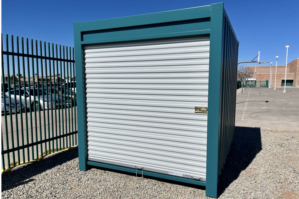 10ft high cube Shipping Container Modified with teal paint and end roll up door