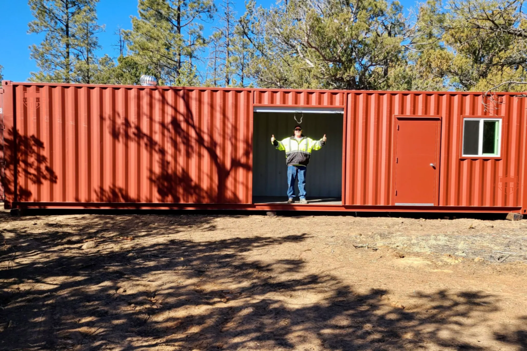 40ft Modified Shipping Container with walk door, side roll up door, window, and whirlybird